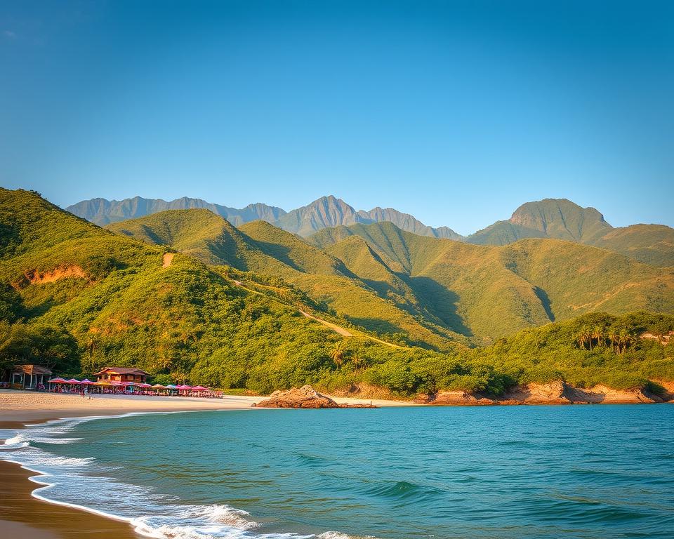 A stunning landscape showcasing the diverse attractions surrounding Huế, Vietnam. In the foreground, a serene beach with gentle waves lapping at the shore, dotted with colorful beach umbrellas and soft white sand. In the middle ground, lush green hills rise, interspersed with vibrant tropical plants and winding trails inviting exploration. In the background, the majestic mountains of Central Vietnam loom under a clear blue sky, illuminated by warm golden sunlight, casting soft shadows. The atmosphere exudes tranquility and adventure, perfect for nature lovers and travelers. Capture a wide-angle view to convey the vastness of the landscape, ensuring the light is soft and inviting, enhancing the beauty of this vibrant region.